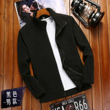 Black jacket over a white shirt