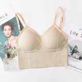 Beige bralette on a magazine background