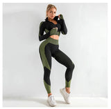 Woman wearing a green and black athletic outfit on a white background