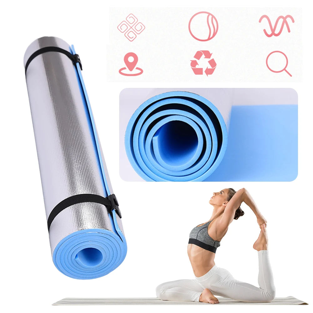 Athletic Sanctuary 10MM EVA yoga mat with thick, non-slip surface for exercise and camping activities, laid out on a wooden floor.