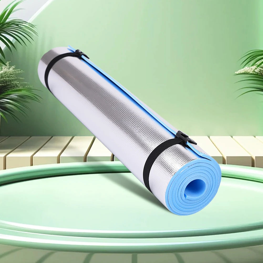 Athletic Sanctuary 10mm EVA yoga mat with thick, anti-slip surface for exercise and camping, shown rolled out on a wooden floor.