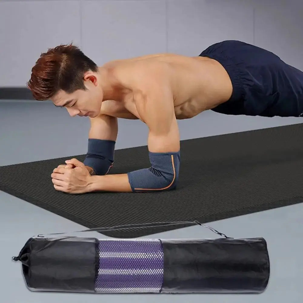 Portable yoga mat bag from Athletic Sanctuary with breathable mesh and adjustable strap for easy carrying.