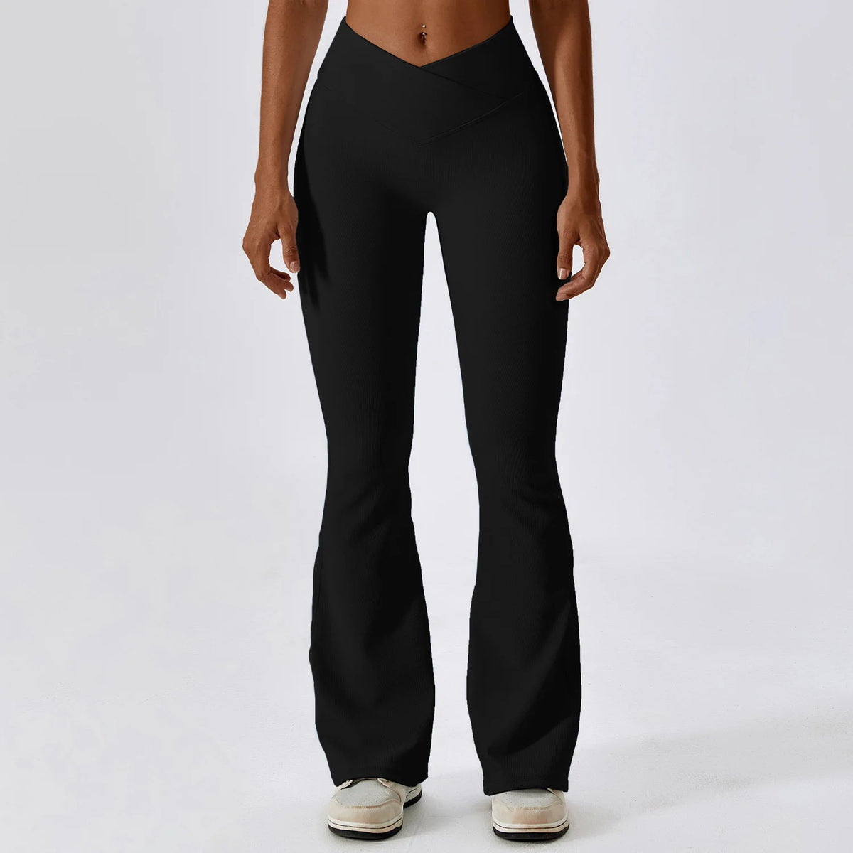Women’s high-waist flared leggings by Athletic Sanctuary, showcasing a sleek, sculpted fit and flowing flare design on a model.