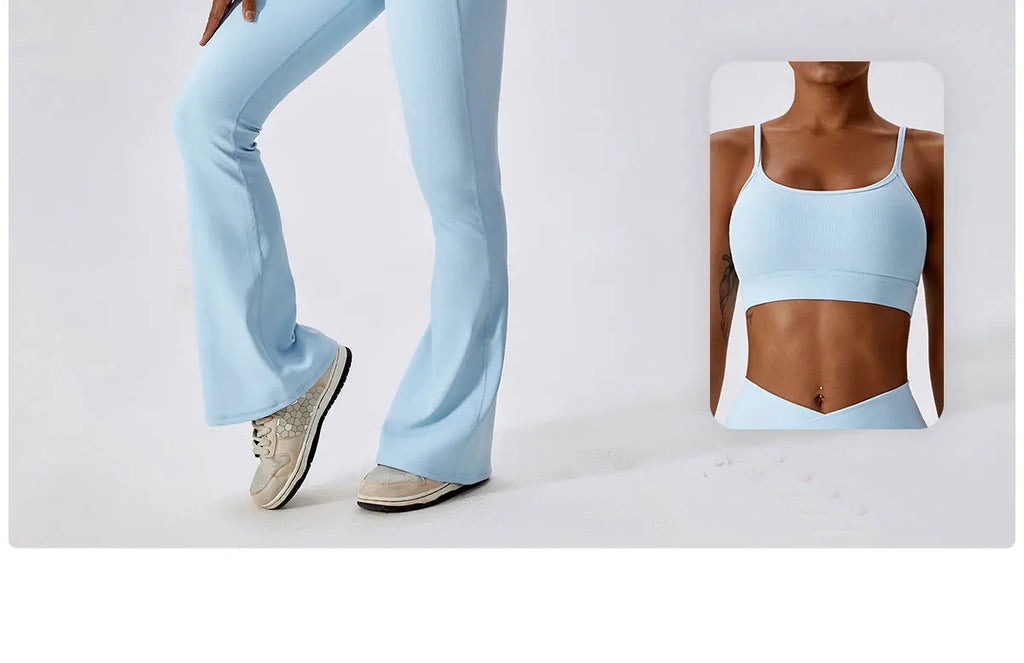 Women’s high-waist flared leggings by Athletic Sanctuary with a sculpt and flow performance fit, shown in black on a model.