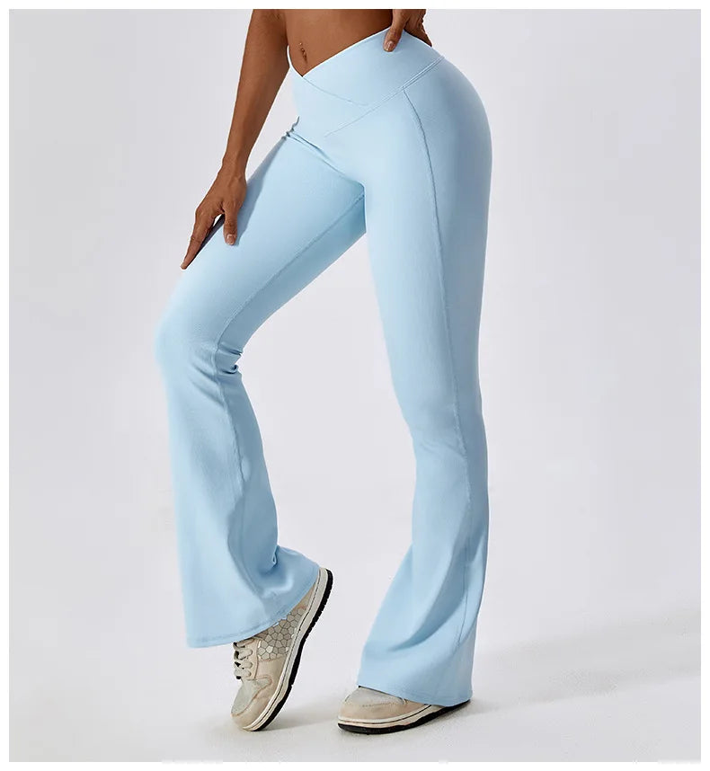 Women’s high-waist flared leggings from Athletic Sanctuary, featuring a sculpting fit and flowing style for active wear.