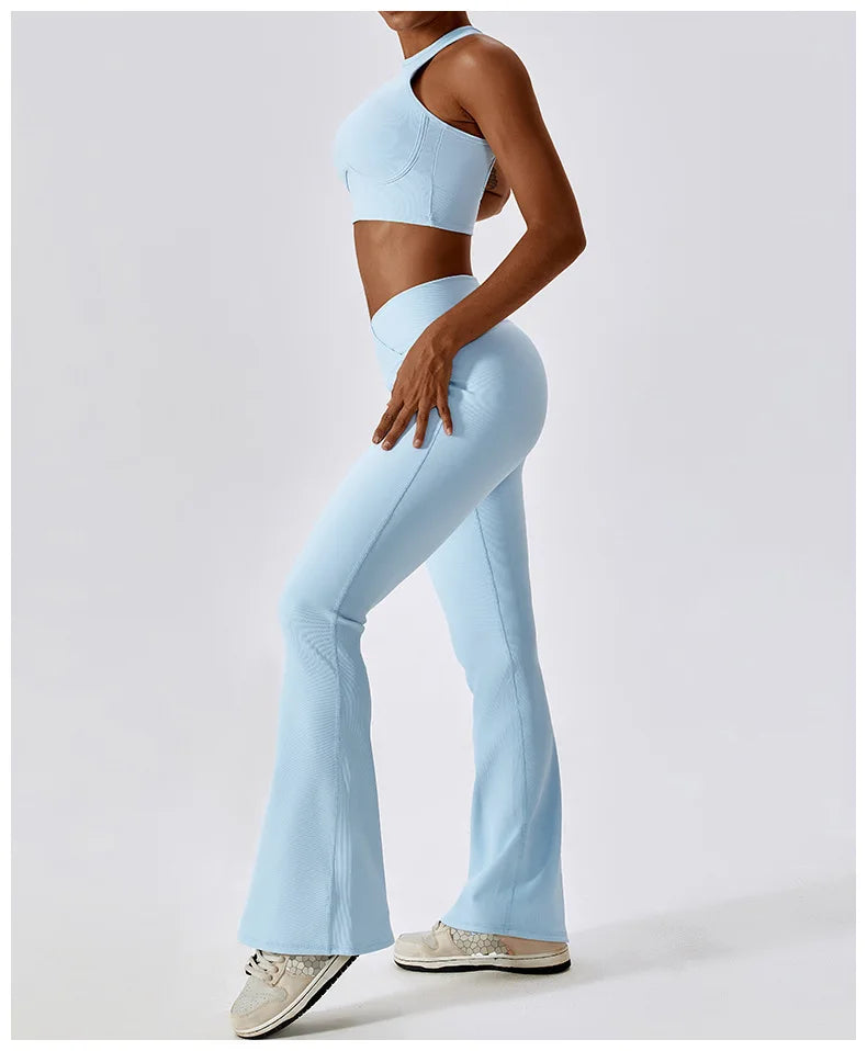 Women’s high-waist flared leggings from Athletic Sanctuary showcasing a sculpted fit and flowing leg design.