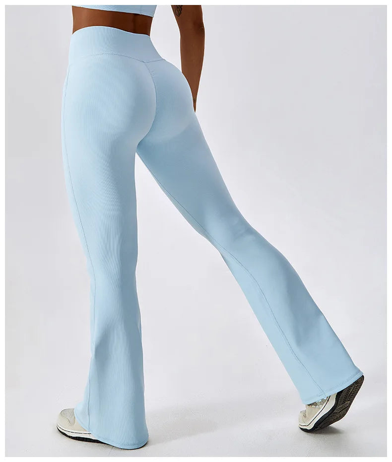 Women’s high-waist flared leggings by Athletic Sanctuary, featuring a sculpting fit and flowy style for active or casual wear.