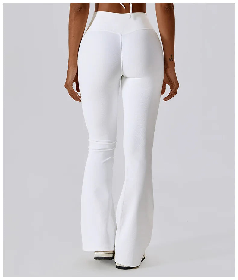 Women’s high-waist flared leggings by Athletic Sanctuary, showcasing a sculpted fit and flowing flare design in a performance fabric.