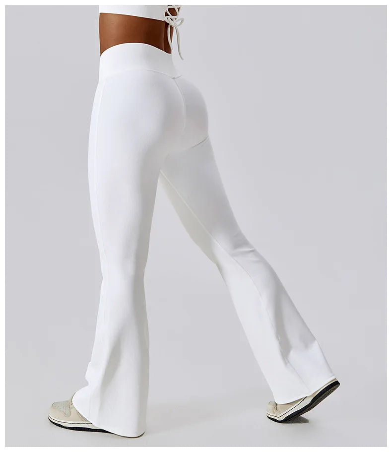 Women’s high-waist flared leggings from Athletic Sanctuary featuring a sculpting fit and flowy leg design for active wear.