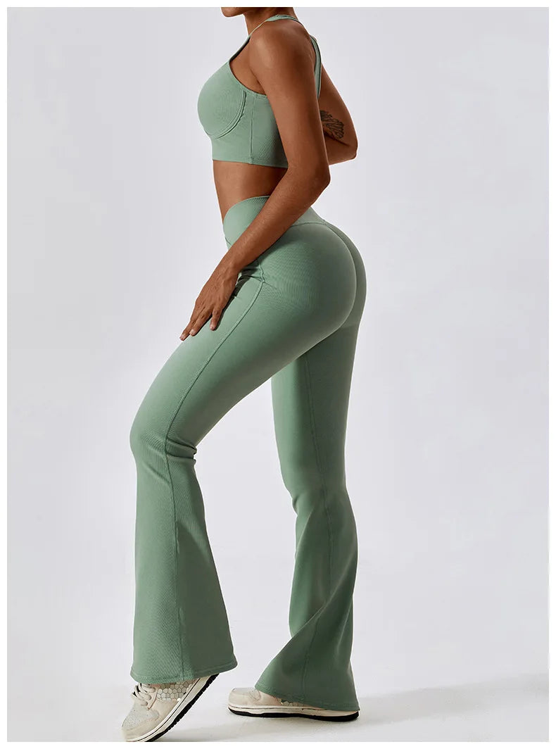 Women’s high-waist flared leggings by Athletic Sanctuary featuring a sculpting fit and flowy leg design.