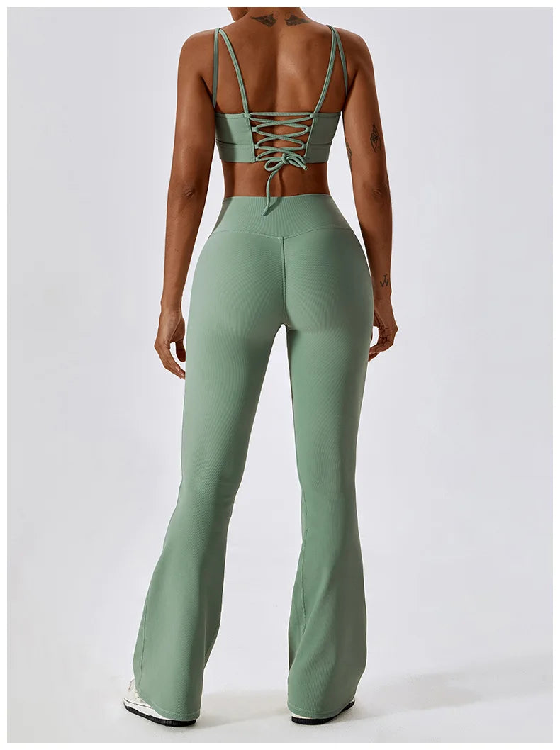 Women’s high-waist flared leggings by Athletic Sanctuary featuring a sculpting, flowy fit and stretchy performance fabric.