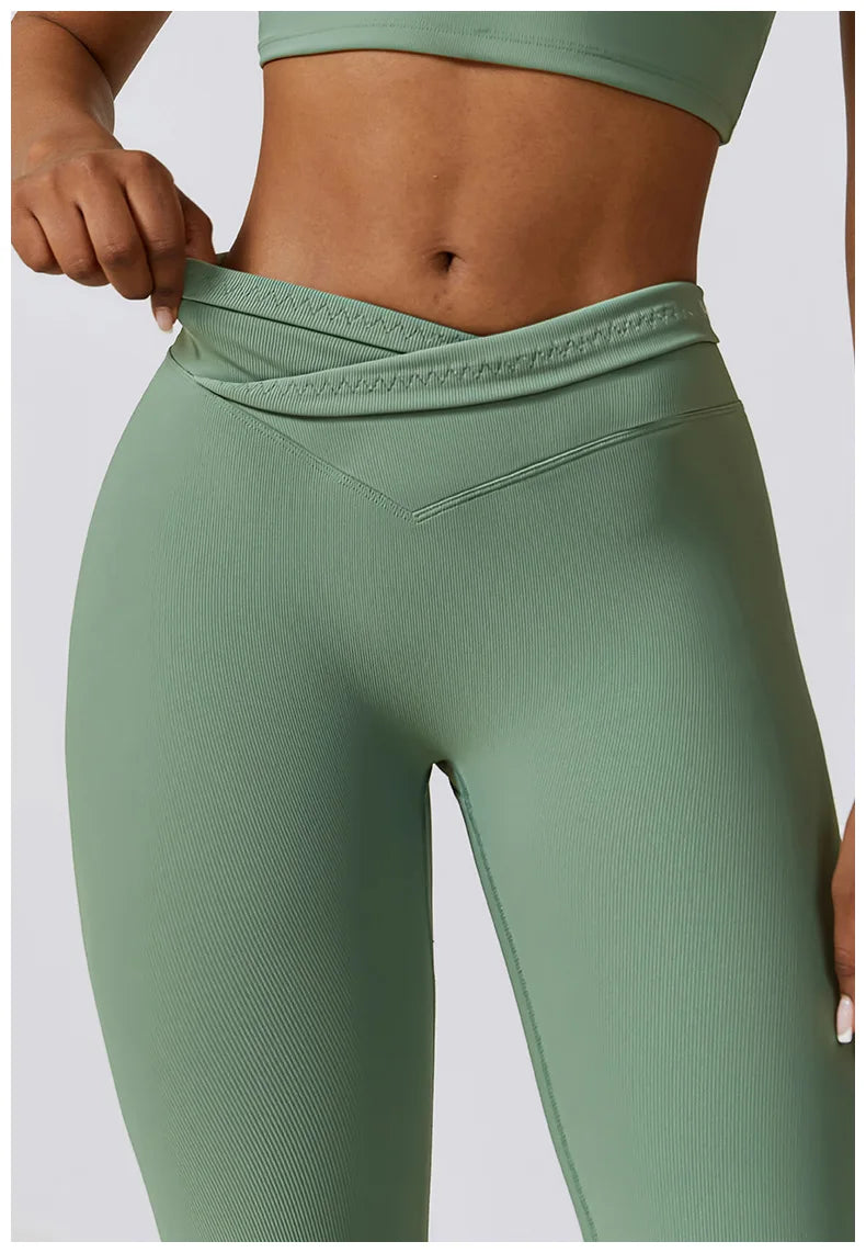 Women’s high-waist flared leggings by Athletic Sanctuary featuring a sculpting, flowy fit and performance fabric.