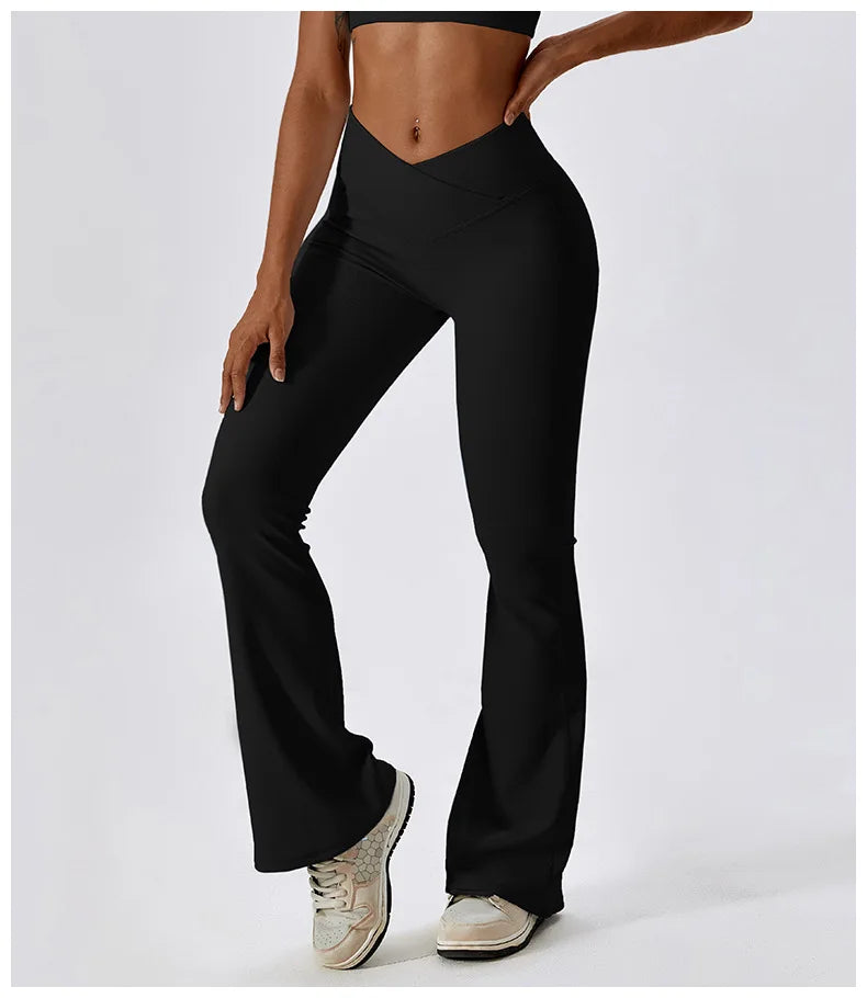 Women’s high-waist flared leggings from Athletic Sanctuary, featuring a sculpting fit and flowing flare design for active wear.