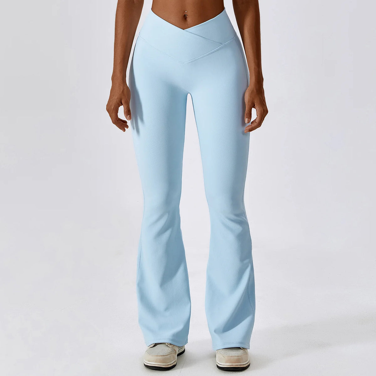 Women’s high-waist flared leggings by Athletic Sanctuary, shown in black, featuring a sculpting fit and flowing style for active wear.