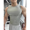 Men’s seamless ribbed gym tank top by Athletic Sanctuary featuring quick-dry fabric and muscle fit design, shown in black.