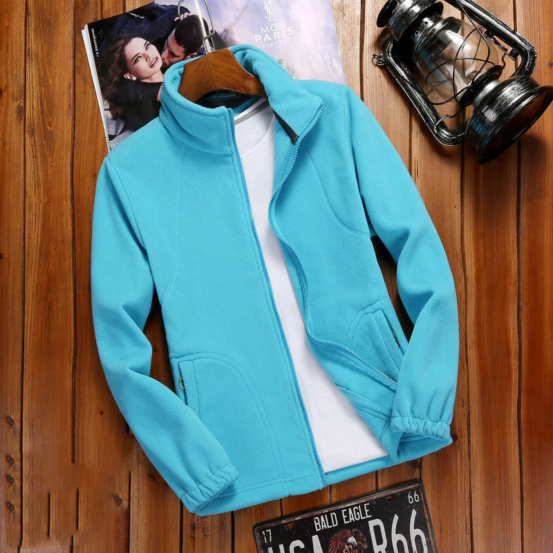 Blue women's fleece zip-up sweatshirt from Athletic Sanctuary, a cozy casual running jacket with a front zipper and soft fleece fabric.