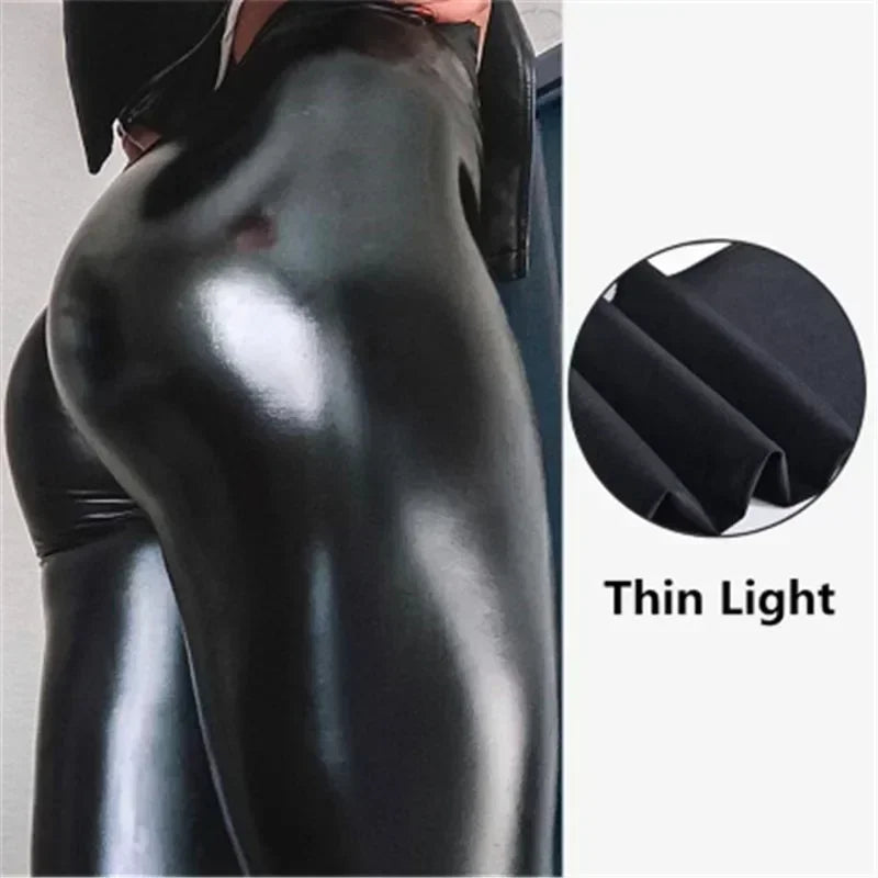 Black shiny women's high waist PU leather leggings by Athletic Sanctuary, slim fit with a hip-lift design for a sleek look.