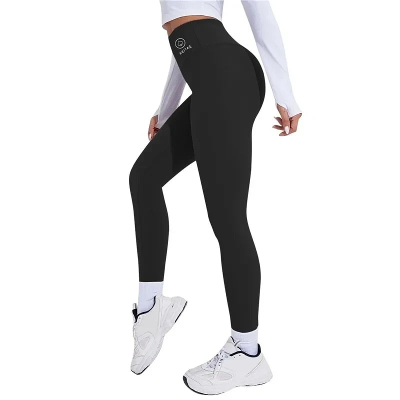 Women's high waist push-up yoga leggings by Athletic Sanctuary, gym fitness tights showing a snug fit and stretchy fabric.