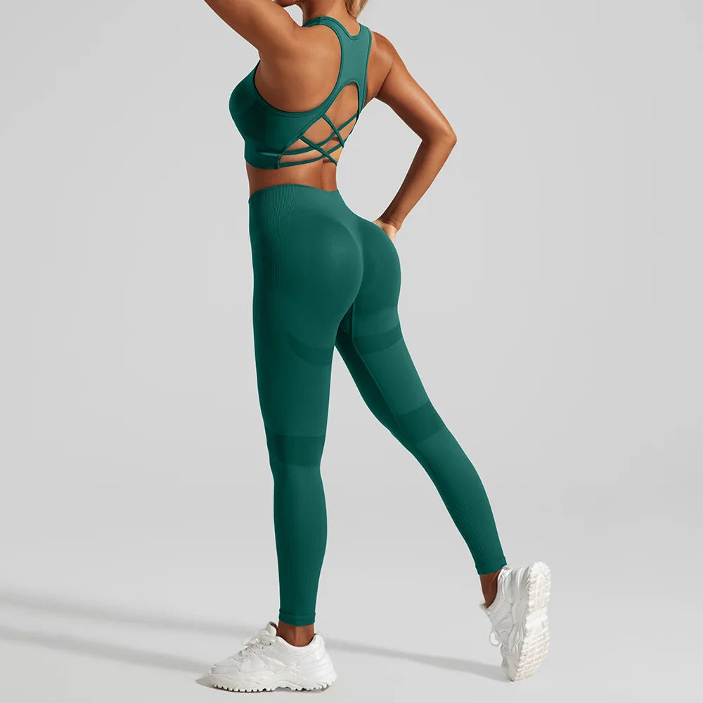 Women’s seamless gym set featuring high waist booty lift leggings and matching sports bra from Athletic Sanctuary.