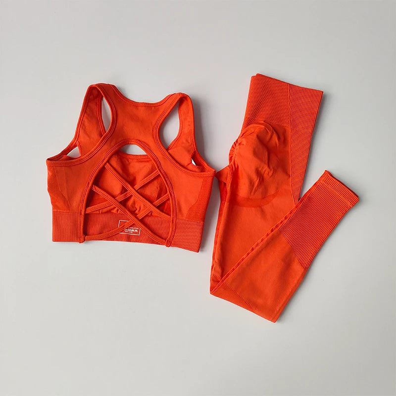 Women’s seamless gym set with high waist leggings and sports bra by Athletic Sanctuary, shown on a model in a gym setting.