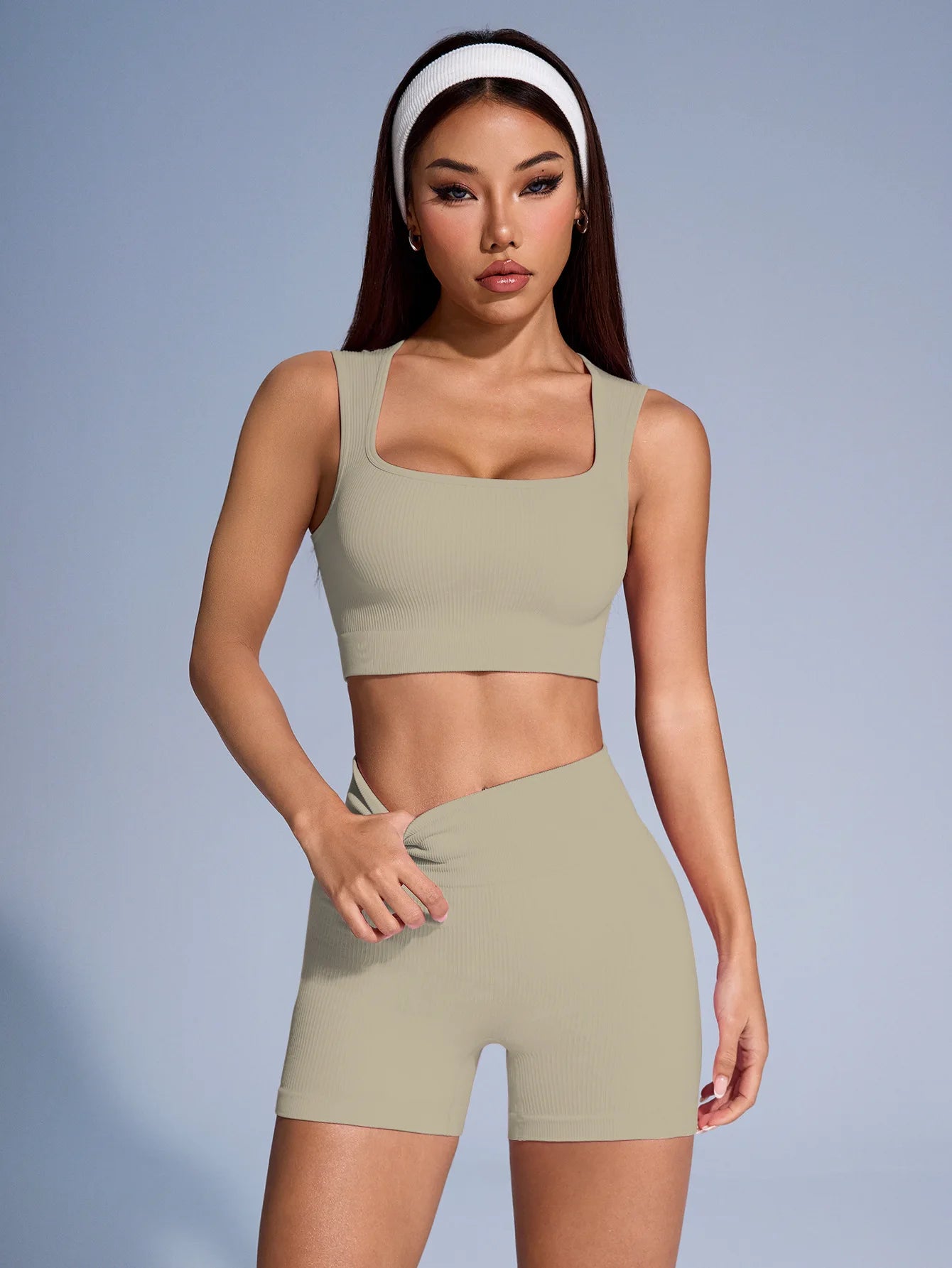 Women’s seamless ribbed workout set from Athletic Sanctuary with crop tank and shorts, breathable activewear for exercise.