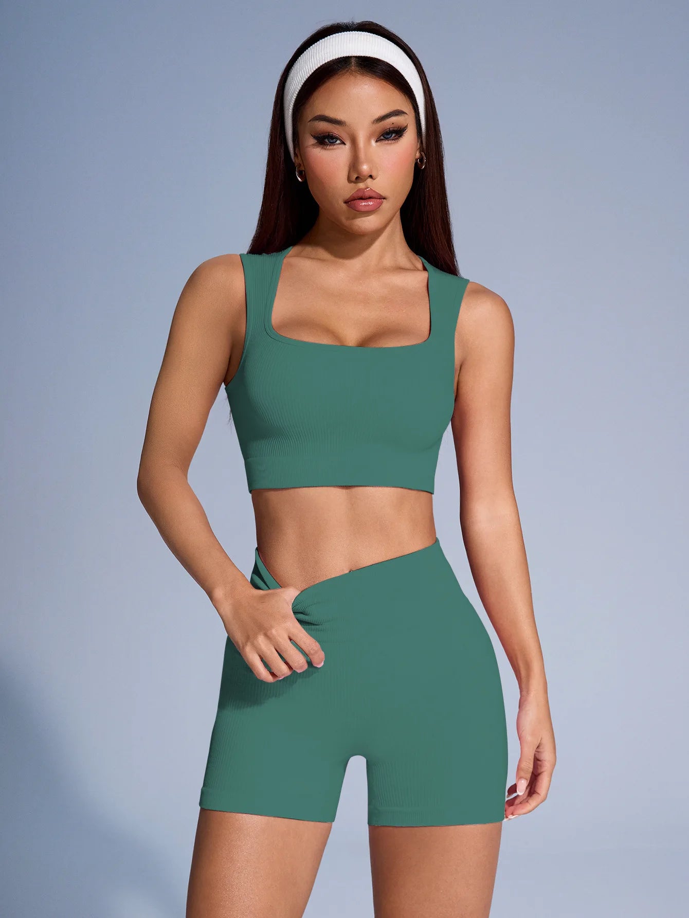 Women’s seamless ribbed workout set with crop tank and shorts from Athletic Sanctuary, styled for active wear and comfort.