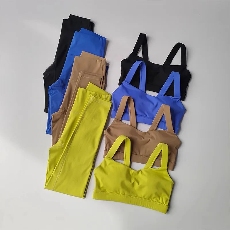 Women’s seamless yoga set by Athletic Sanctuary featuring a push-up sports bra and high waist leggings for comfortable exercise wear.