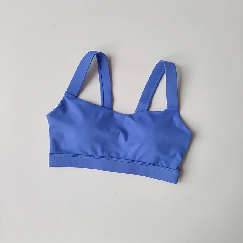Women’s seamless yoga set by Athletic Sanctuary featuring a push-up sports bra and high waist leggings, shown in a comfortable stretch fit.