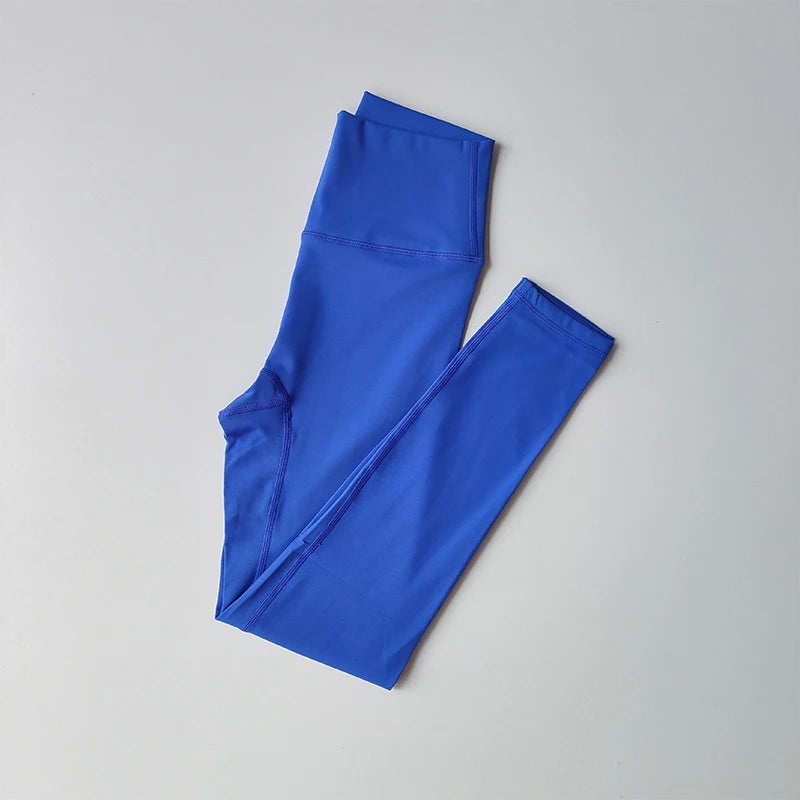 Women’s seamless yoga set with push-up sports bra and high waist leggings by Athletic Sanctuary, shown in a comfortable, stylish fit.