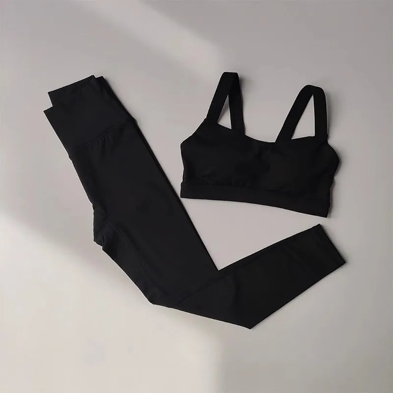 Women’s seamless yoga set with push-up sports bra and high-waist leggings by Athletic Sanctuary, shown in a comfortable activewear style.