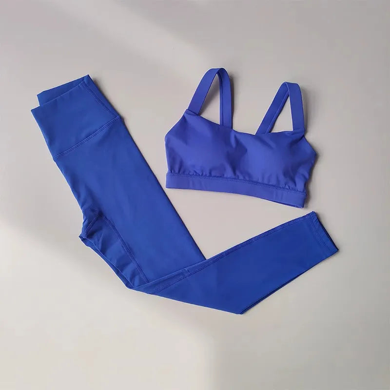 Women’s seamless yoga set with push-up sports bra and high waist leggings by Athletic Sanctuary, shown in a comfortable, fitted design.