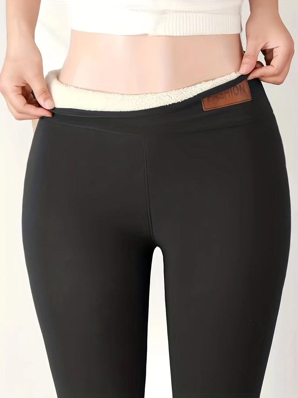 Women’s high-waisted winter leggings by Athletic Sanctuary, soft stretch tights designed for warmth and comfort.