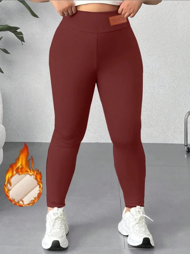 Women’s high-waisted winter leggings by Athletic Sanctuary, soft stretch tights designed for warmth and comfort.