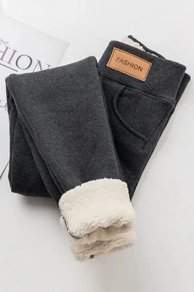 Women’s warm high-waisted leggings from Athletic Sanctuary with soft winter stretch fabric, ideal for cold weather comfort.