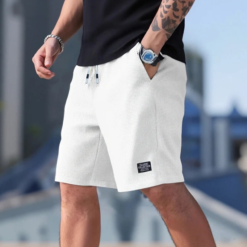 Men’s athletic performance shorts by Athletic Sanctuary featuring breathable fabric, ideal for training and everyday wear.