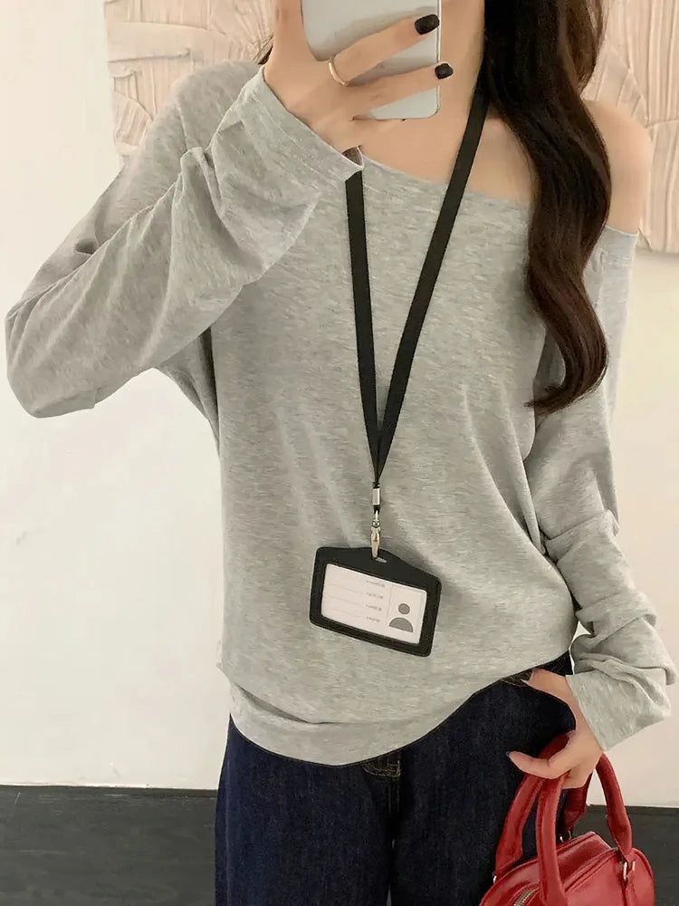 Women's oversized long sleeve top by Athletic Sanctuary, soft and comfortable for everyday wear, shown in a relaxed fit.