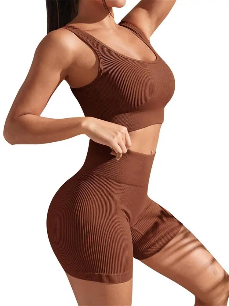 Women’s Athletic Sanctuary seamless ribbed workout set with high-waist shorts and crop tank for active women.