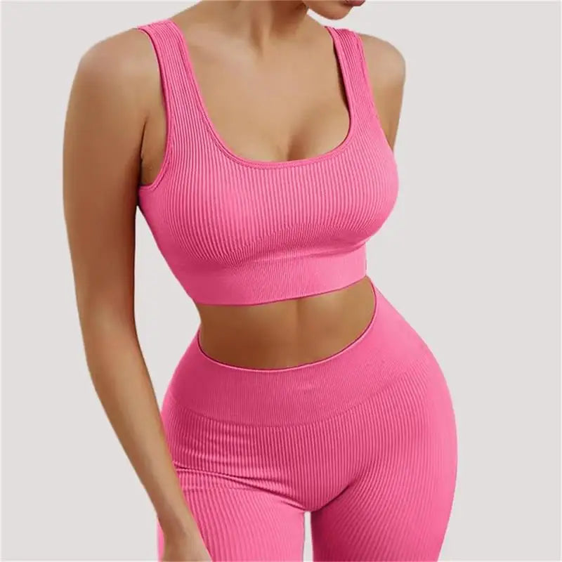 Women's seamless ribbed workout set with crop tank and high-waist shorts by Athletic Sanctuary, ideal for running and gym sessions.