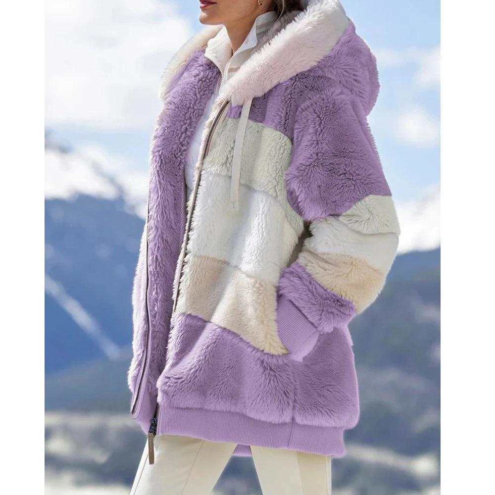 Women's oversized athletic sanctuary coat with a warm zip-up design, featuring a comfortable, casual fit and cozy fabric.