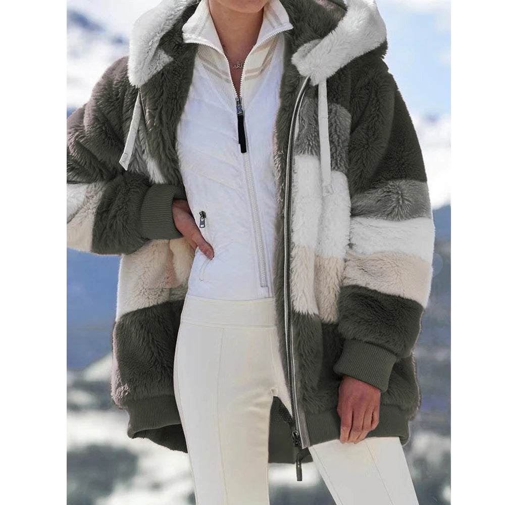 Women’s oversized athletic sanctuary coat with a warm zip-up design, featuring a comfortable, relaxed fit and cozy fabric.