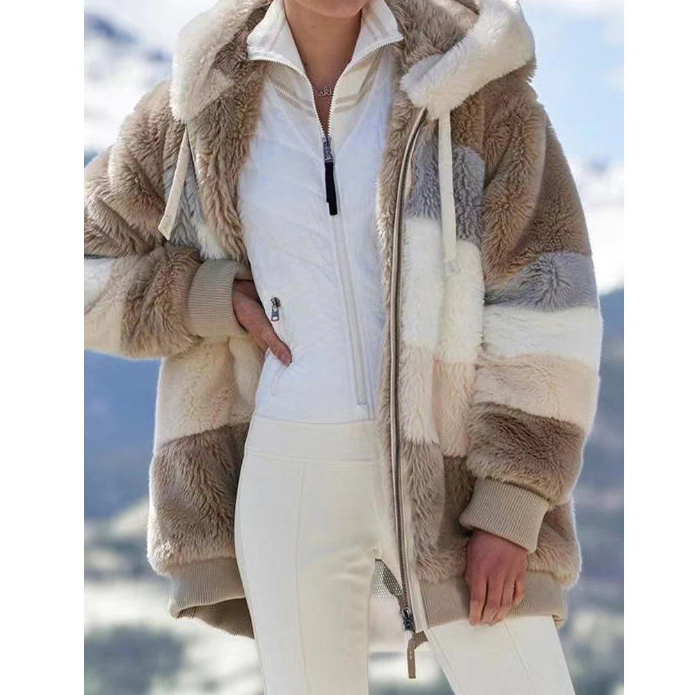 Women's oversized athletic sanctuary coat, warm zip-up essential outerwear with a comfortable, relaxed fit for cold weather.
