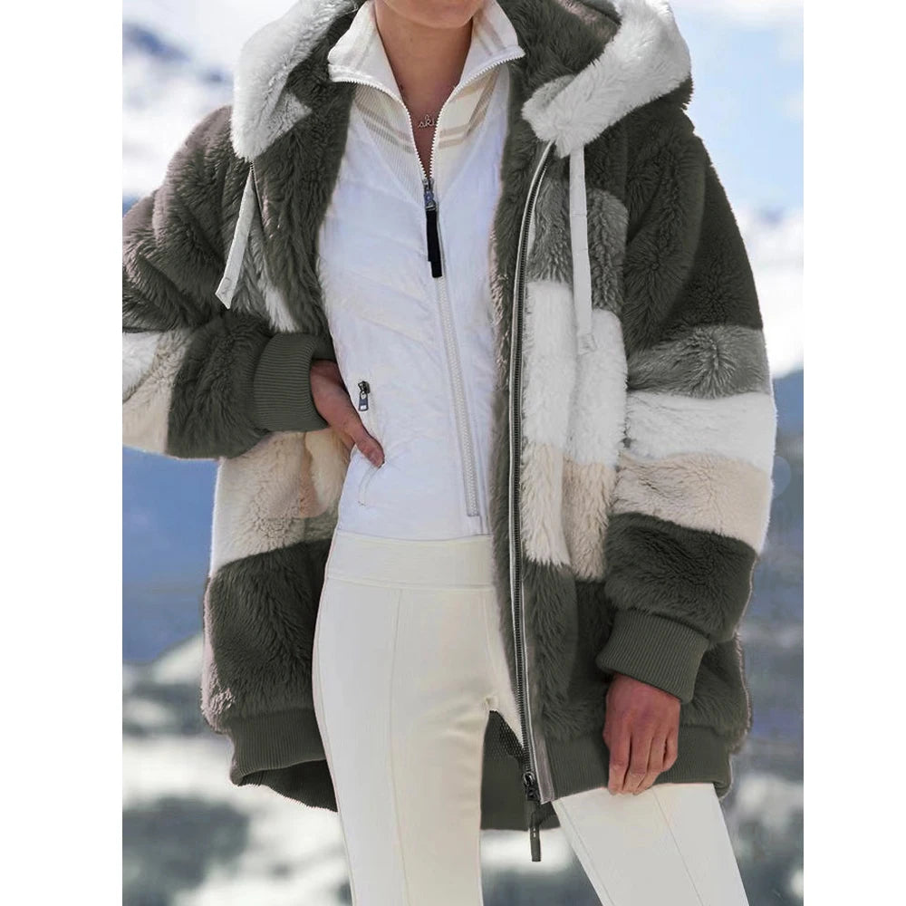 Women’s oversized athletic Sanctuary coat with a warm zip-up design, ideal for cozy, casual layering in cold weather.