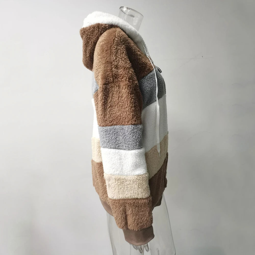 Women's oversized athletic sanctuary coat with warm zip-up design, soft comfort layer, perfect for casual winter wear.