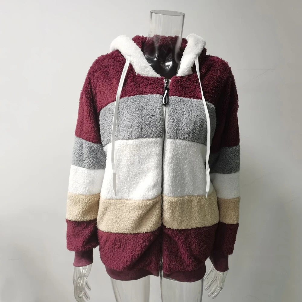 Women’s essential oversized Athletic Sanctuary coat featuring a warm zip-up design, perfect for cozy, casual layering.