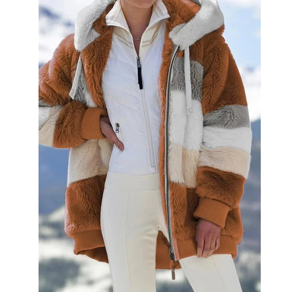 Women’s oversized athletic sanctuary coat with warm zip-up design, featuring a cozy, comfortable fit for cold weather.