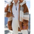 Women’s oversized athletic sanctuary coat with warm zip-up design, featuring a cozy, comfortable fit for cold weather.