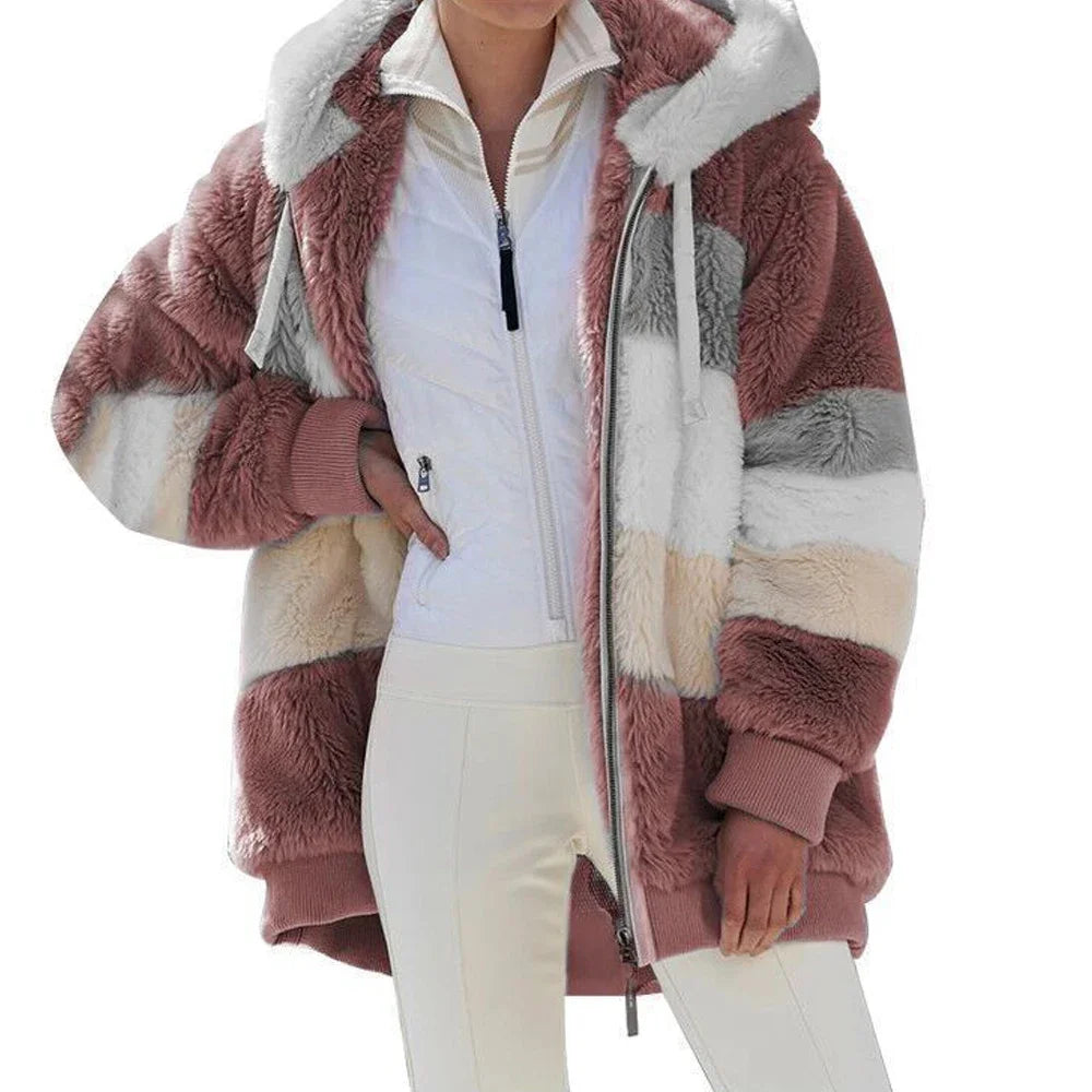 Women’s oversized athletic sanctuary coat with a warm zip-up design, stylish comfort layer for cold weather.
