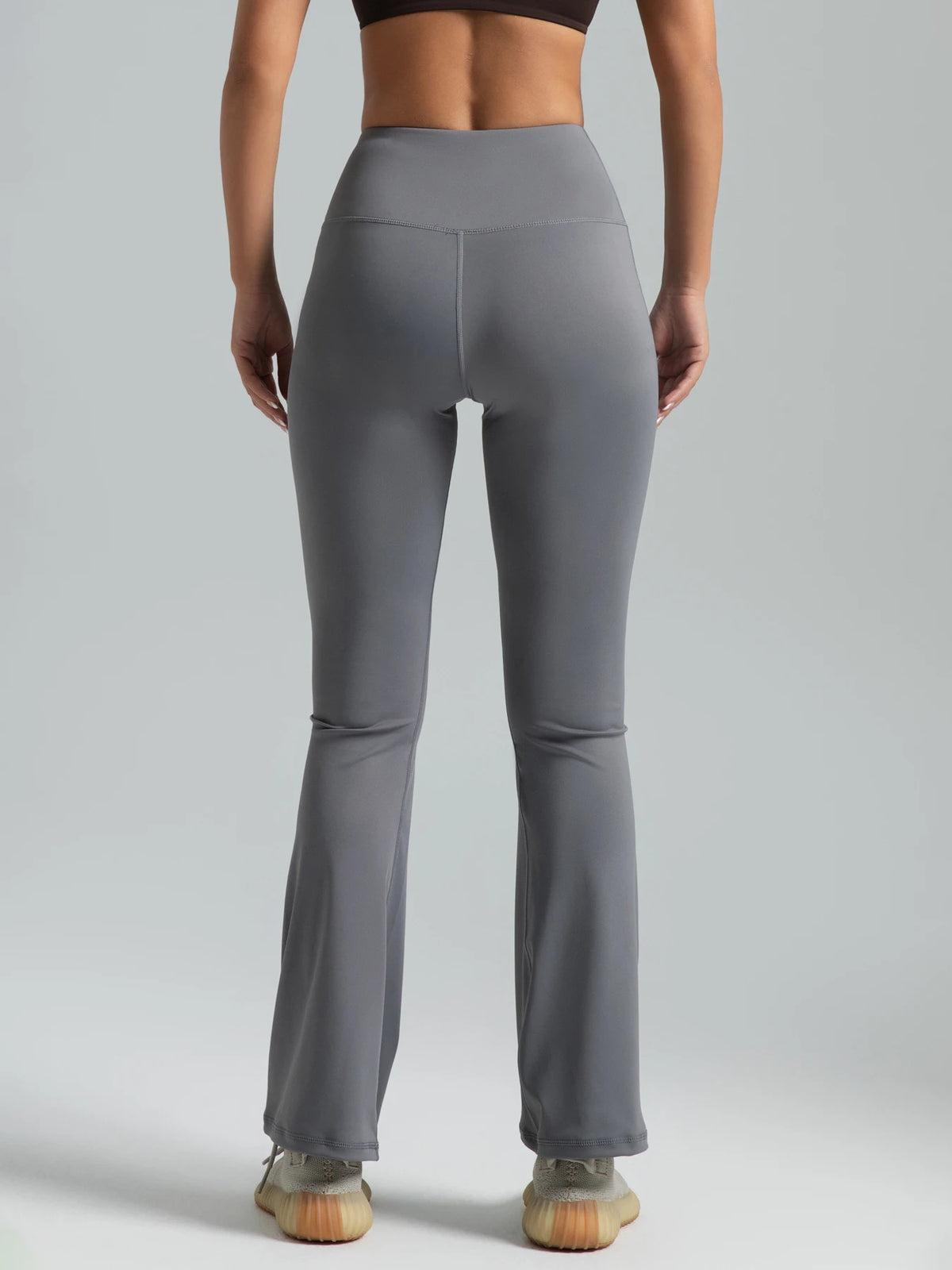 Women’s high-waist flared yoga pants by Athletic Sanctuary, sculpting leggings for comfortable movement and everyday wear.