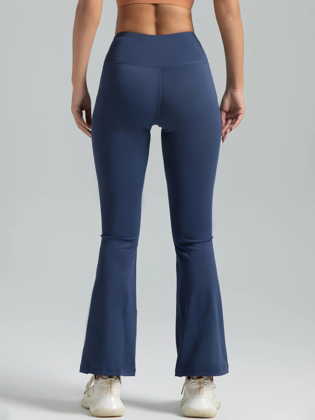 High-waist flared yoga pants by Athletic Sanctuary, showcasing their supportive fit and stylish design for workouts and daily wear.
