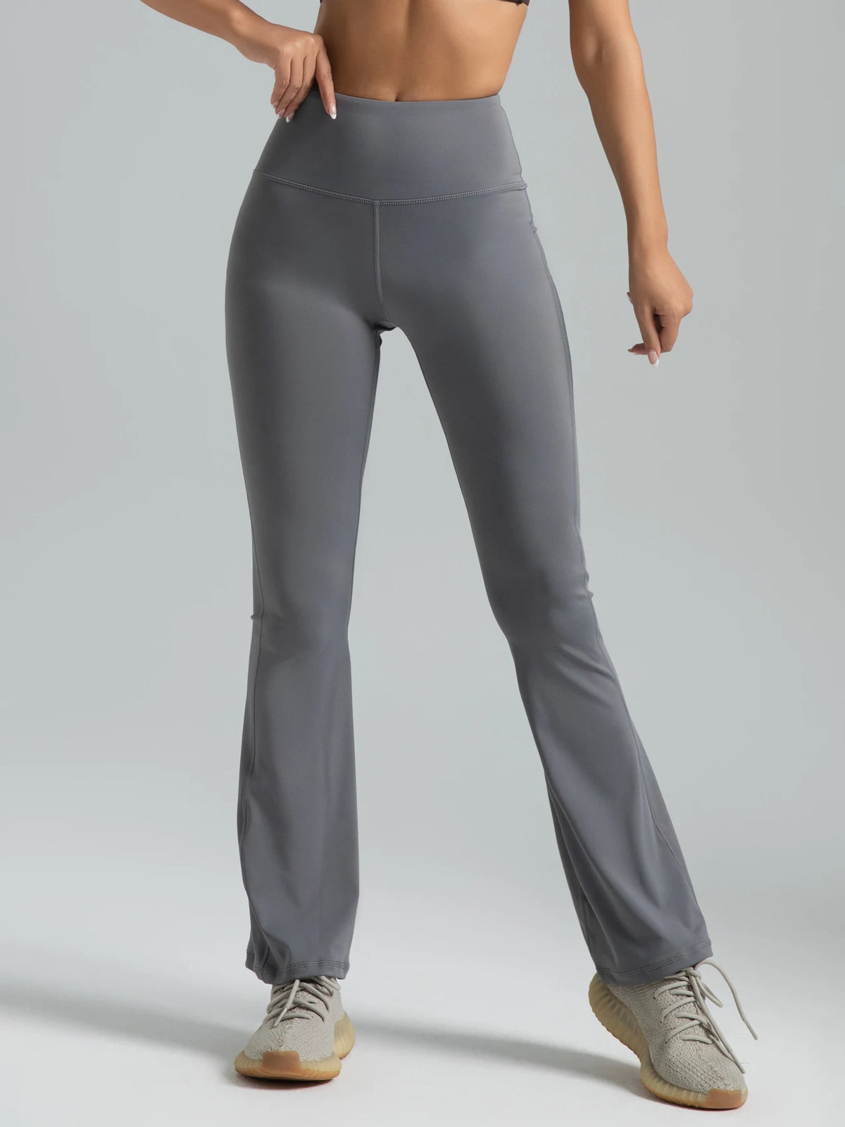 High-waist flared yoga pants by Athletic Sanctuary, featuring a supportive fit, perfect for workouts and casual wear.